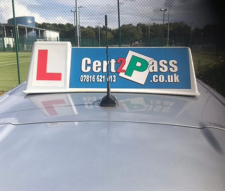 car with cert2pass logo and telephone number